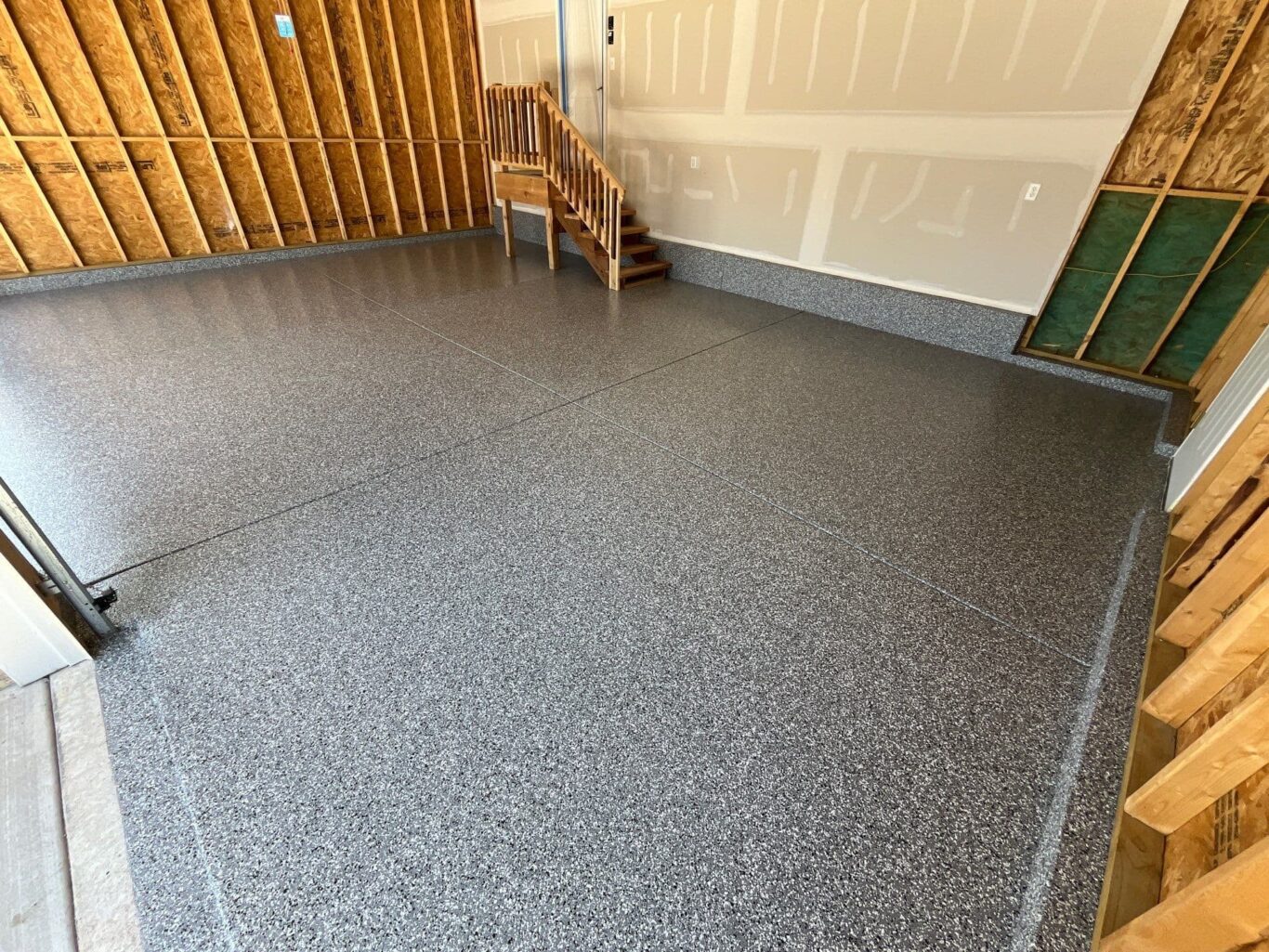 Completed garage floor coating in Andover with polyurea and polyaspartic system.